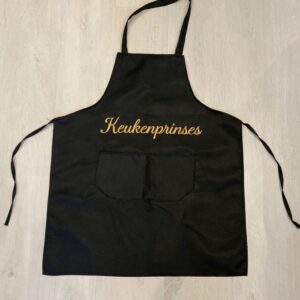 Schort met geborduurde tekst